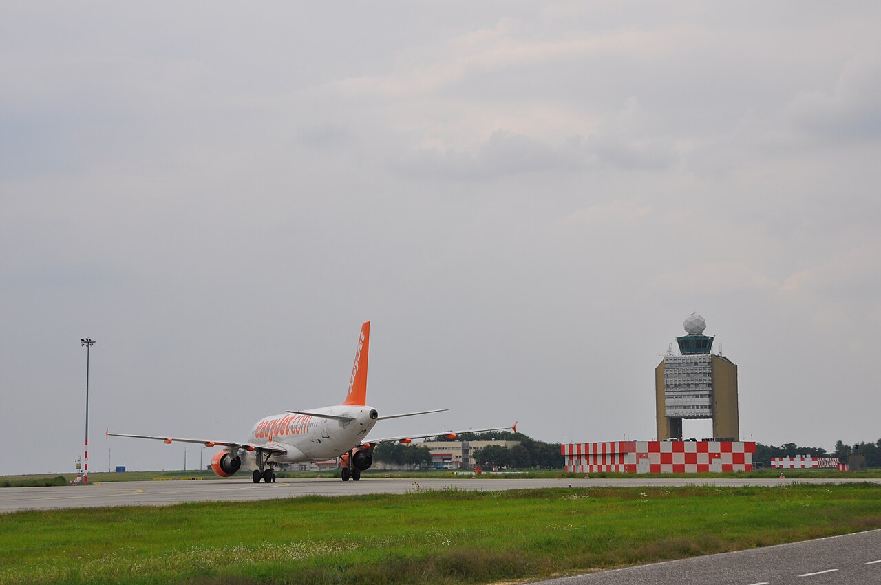 Control tower and aircraft at Budapest Ferenc Liszt International Airport
