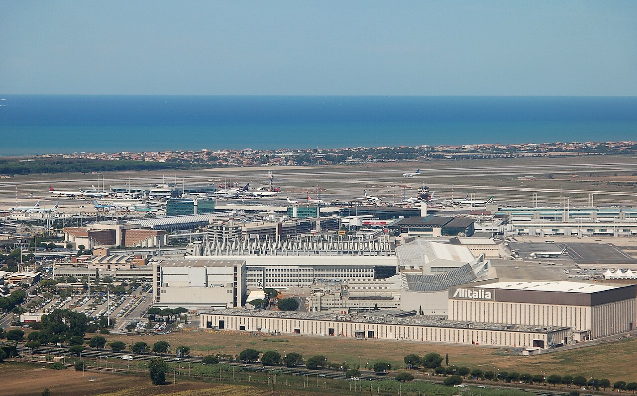 Aerial view of Rome Fiumicino Leonardo da Vinci airport with terminals and parked aircraft