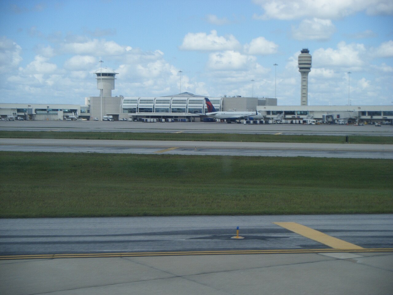 Orlando International Airport terminal and palm trees