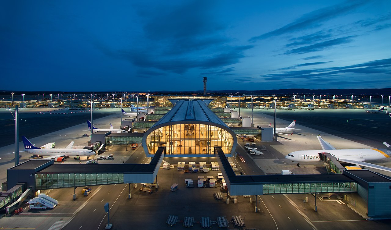 Oslo Gardermoen Airport terminal with its curved timber roof