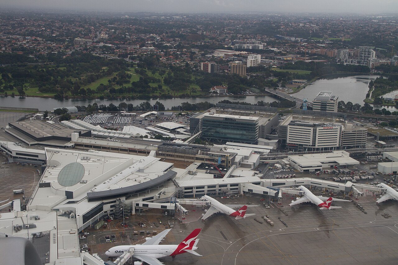 Sydney Kingsford Smith Airport with the city skyline behind