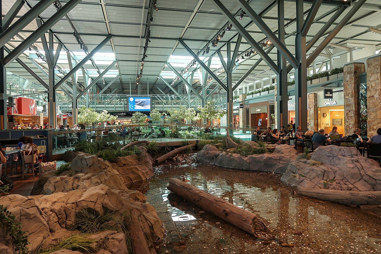 The creek and timber roof inside the Vancouver Airport international terminal