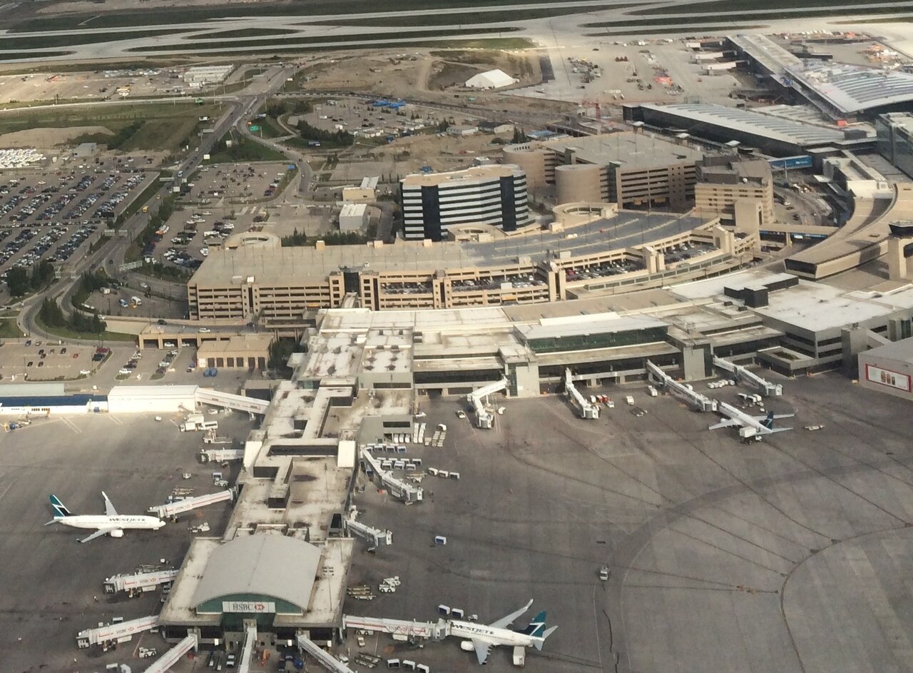 Calgary International Airport terminal exterior with control tower